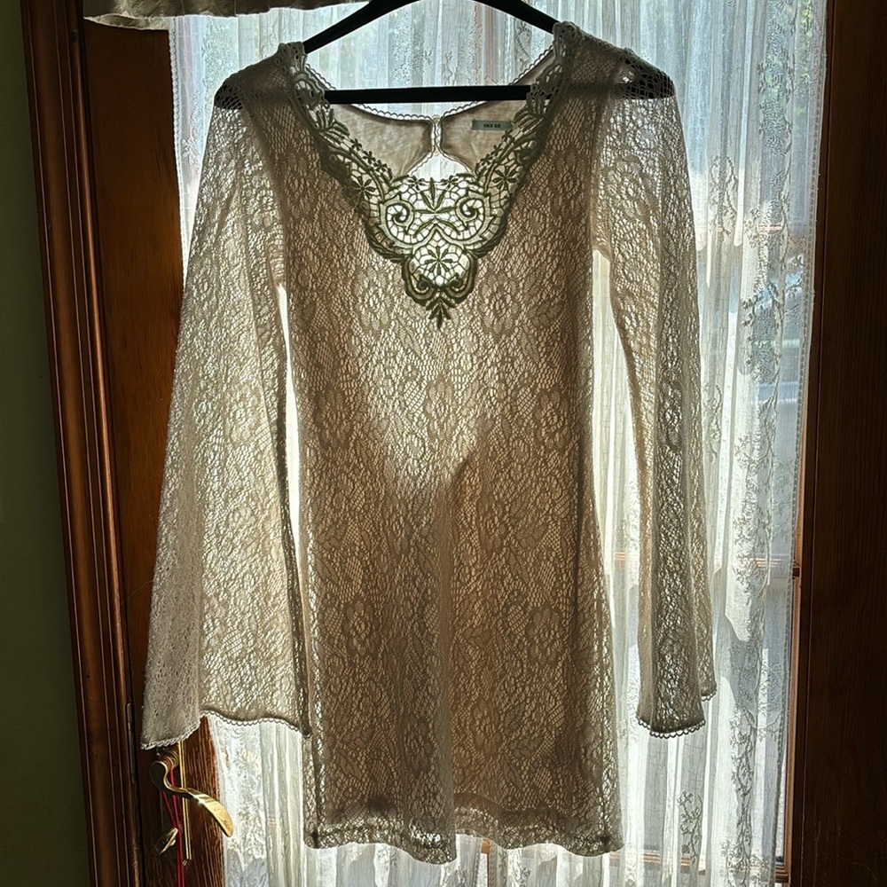 Kimchi blue. Lacey with slip. Back is cut out with decorative buttons, so cute.